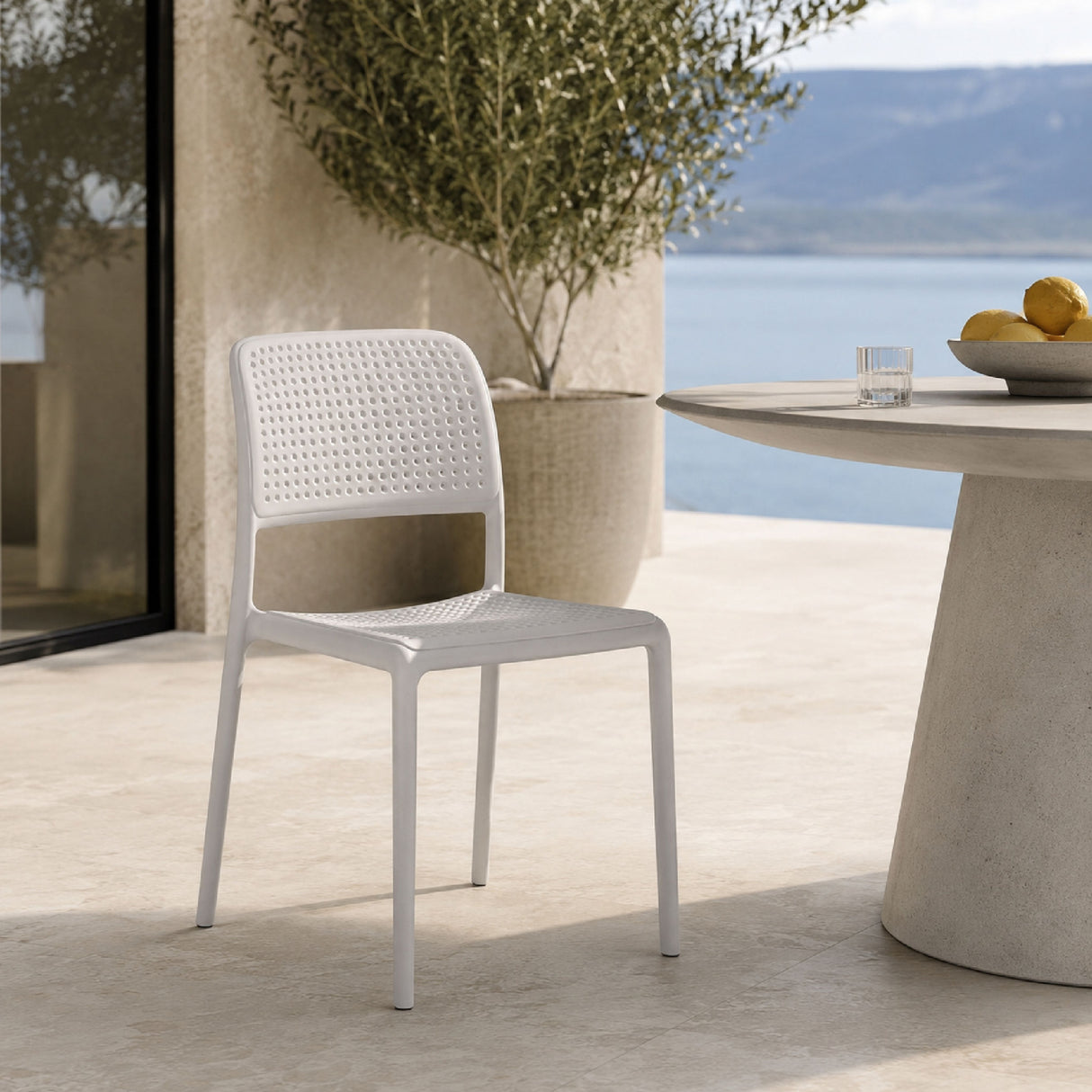 Perforated Fiberglass Outdoor Dining Chair | Oroa.com