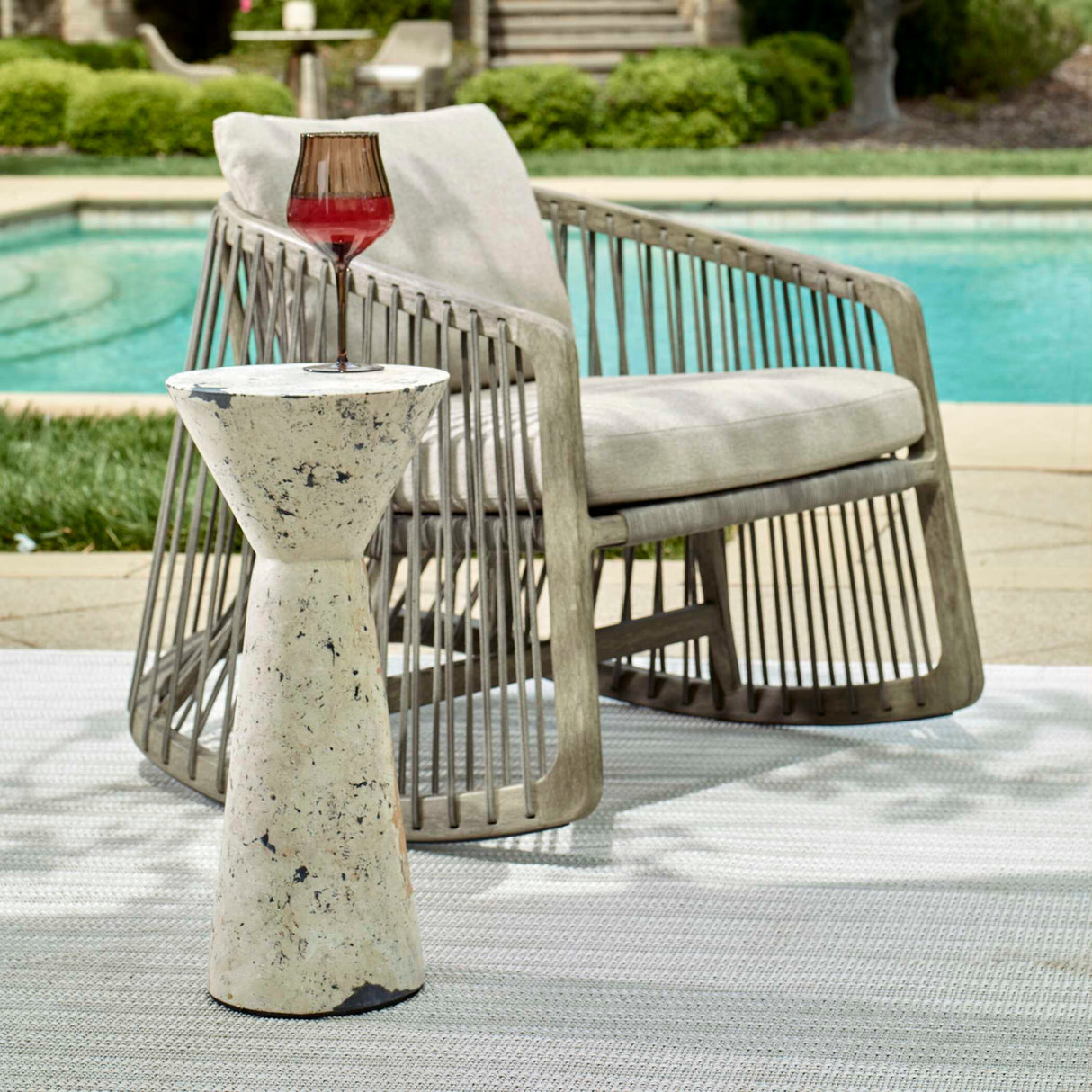 Limestone Hourglass Indoor/Outdoor Drink Table | Oroa.com