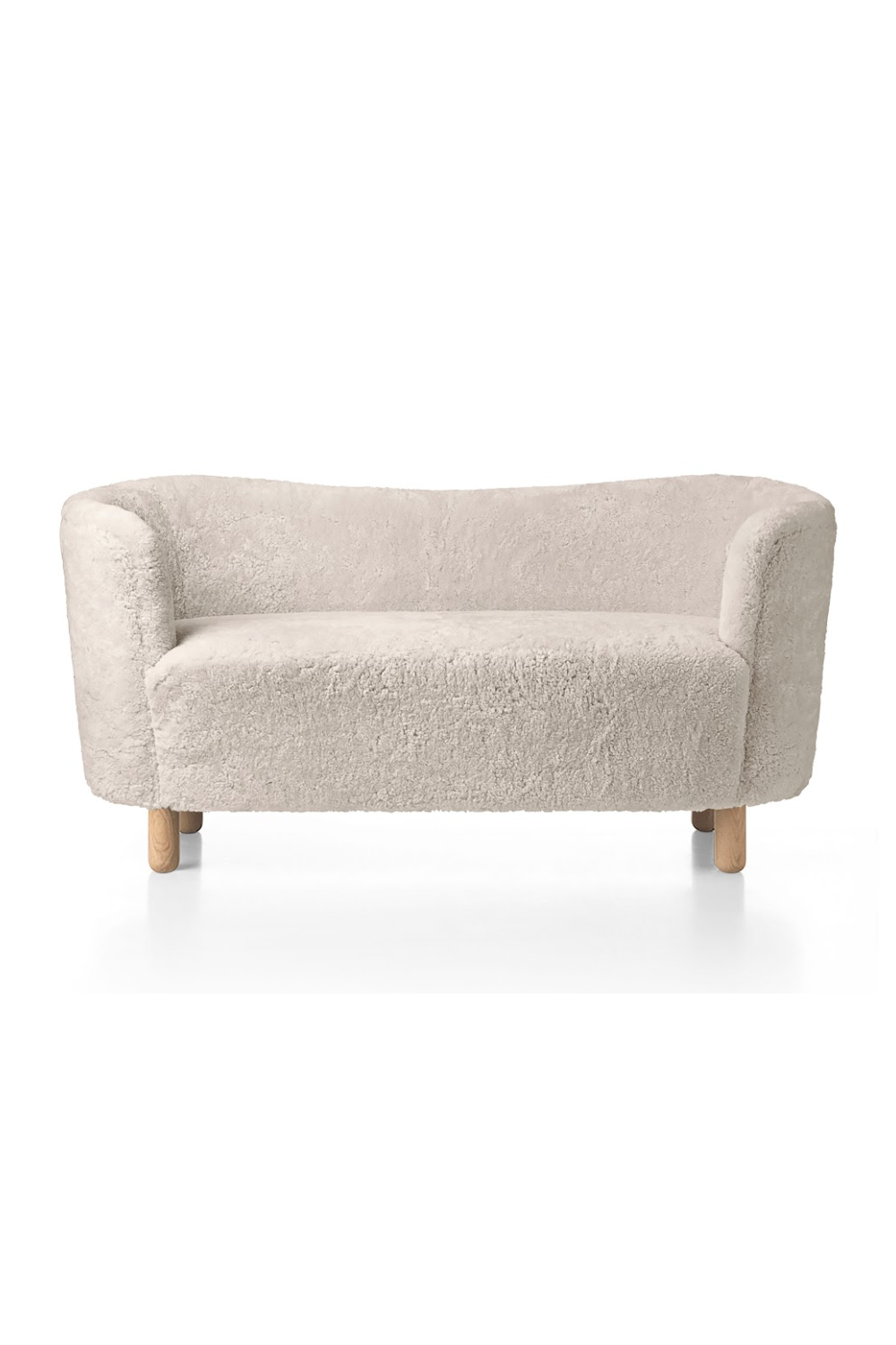 Curved Back Sheepskin Sofa | Audo Copenhagen Mingle