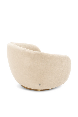 Brass Base Curved Swivel Chair | Eichholtz Brice | Oroa.com