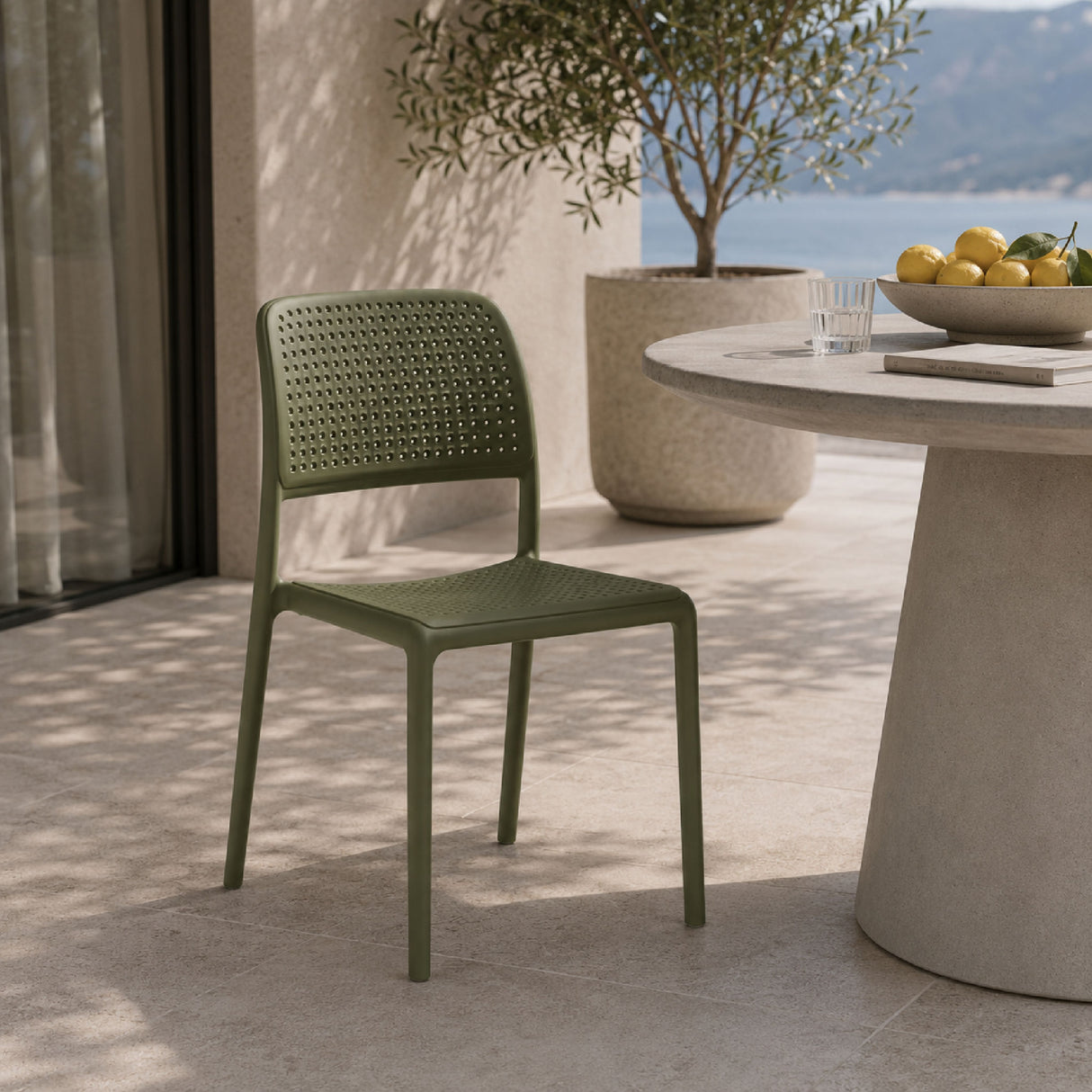   Perforated Fiberglass Outdoor Dining Chair | Oroa.com