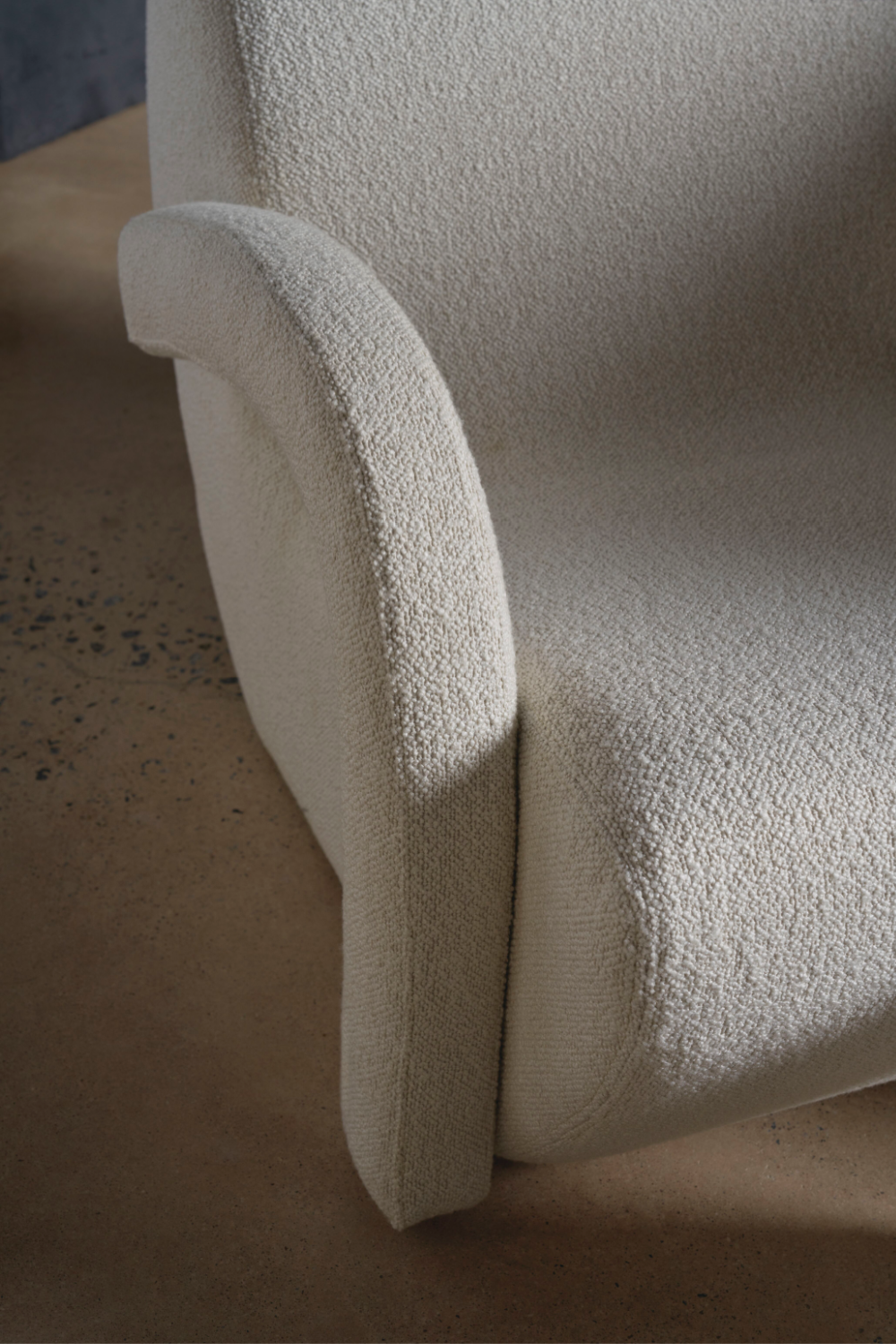 White Bouclé Arched Accent Chair | Andrew Martin Leo | Oroa.com